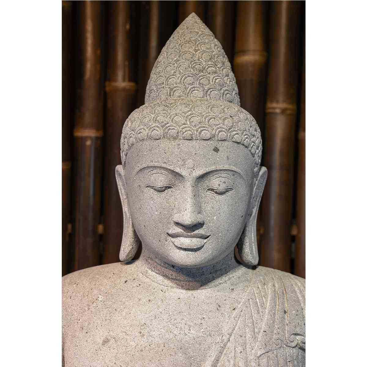 Sitzender Buddha aus Flussstein Erdberührung