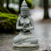 Sitzende Dewi Sri Steinfigur